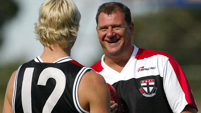 Grant Thomas with Nick Riewoldt during his days in charge of the Saints.