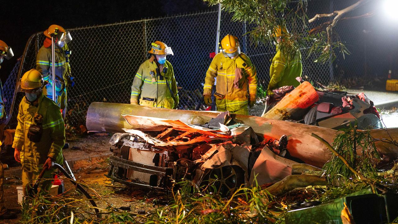 A tree fallen on a car off Belgrave after a heavy storm rolled through. Picture: Mark Stewart