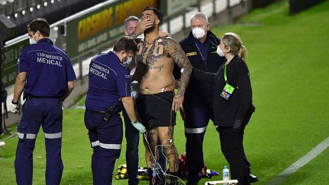 Andrew Fifita before being put in an ambulance. AAP Image/Darren England.