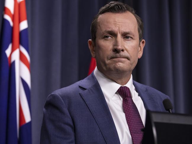 PERTH, AUSTRALIA - FEBRUARY 04: Western Australian Premier Mark McGowan speaks to the media during a press conference at Dumas House on February 4, 2021 in Perth, Australia. Mark McGowan announces a post-lockdown transition period for the Perth and Peel regions. It will remain in place until 12.01am Sunday morning, 14 February Ã¢â¬â allowing for the full 14-day incubation period to run its course. Parts of Western Australia entered a five-day lockdown on February 1, after a hotel quarantine worker tested positive to highly infectious Covid-19 strain. (Matt Jelonek/Getty Images)