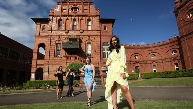 From left, Year 12 students Julia Favotto, Jessica Guerrera, Claudia Tyree and Solange Shina at Santa Sabina College in their party frocks. Picture: Britta Campion