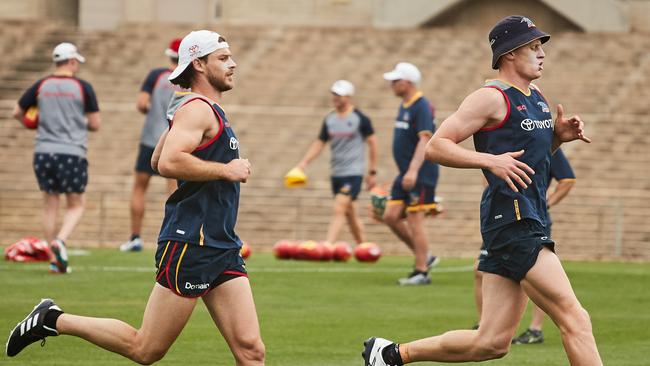 Bryce Gibbs (left) will join the likes of Rory Sloane in the Crows’ engine room. Pic: AAP