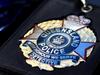 Coast cop charged over alleged assault of younger man
