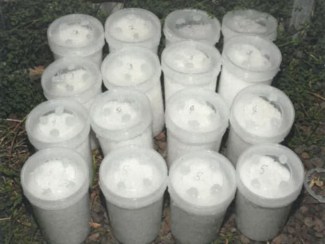 Buckets of ketamine seized by AFP, found in cement shipped from overseas. Picture: AFP