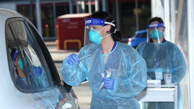 Australian Clinical Labs team members at a COVID drive-through testing site in Geelong. Picture: Alan Barber