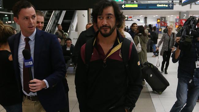 Johnathan Thurston gets some attention on arrival. Photo: Peter Wallis