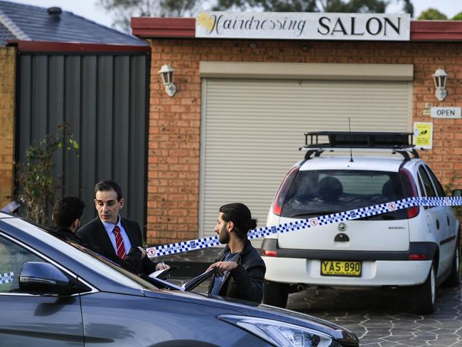 Minto terror/stabbing. Australian Federal Police tape off the hairdressing salon as the investigation continues. Picture: Dylan Robinson
