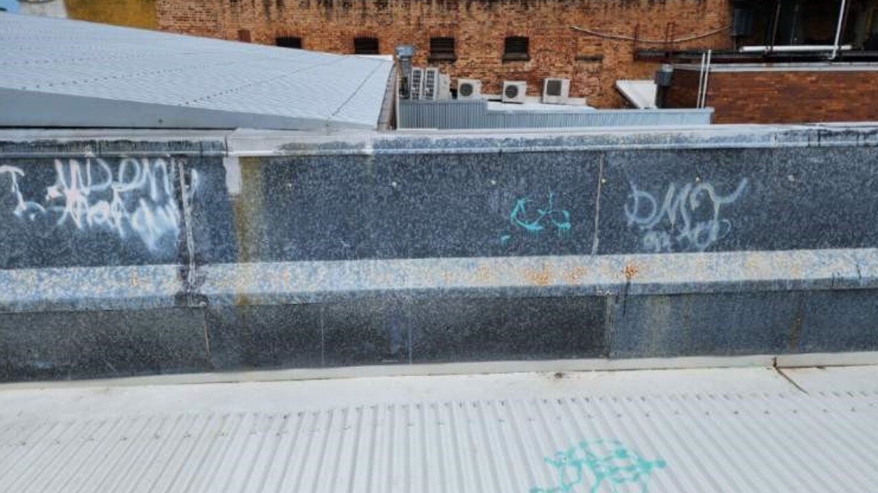 Graffiti on the roof of PNE Art and Framing in the Rockhampton CBD. Picture: Contributed