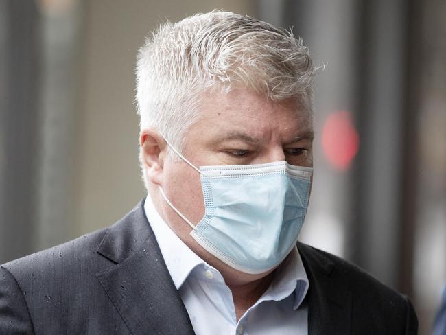 SYDNEY, AUSTRALIA - NewsWire Photos JULY 14, 2022: Stuart MacGill arrives at the Downing Centre local court on Thursday. The former cricketer has been charged with stalking and intimidating a woman. Picture: NCA NewsWire / Nikki Short