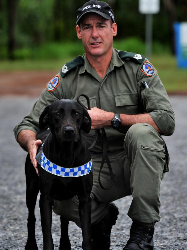 Snr Con Peter Henwood with drug dog Archie in 2011