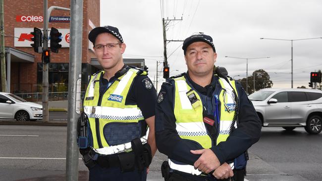 Senior Constable Phil Gibby and Acting Sergeant Mark Dunbabin man the intersection.