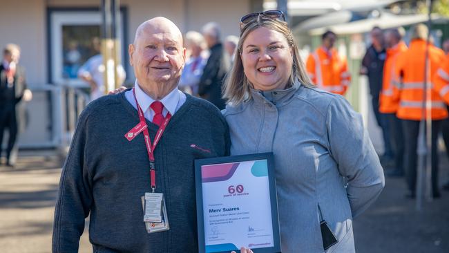 Gympie North Assistant Station Master Mervyn Suares is celebrating a milestone that most will never see - 60 years of continuous employment at Queensland Rail. He is pictured with Kirbey Suares.