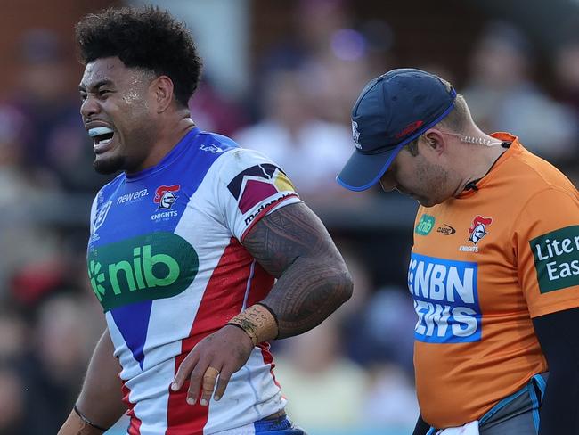 SYDNEY, AUSTRALIA - JULY 14: Greg Marzhew of the Knights is attended to by a trainer during the round 19 NRL match between Manly Sea Eagles and Newcastle Knights at 4 Pines Park on July 14, 2024 in Sydney, Australia. (Photo by Jason McCawley/Getty Images)