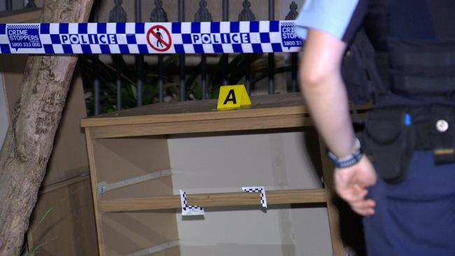 An empty chest of drawers was among the furniture taken by police from the Paddington terrace on Wednesday night. Picture: OnScene Bondi