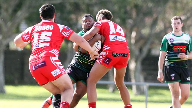 RLGC Round 3 match from Robert Dalley Park. Reserve Grade; Helensvale Hornets vs. Currumbin Eagles. Douglas Ugaia tackled. 23 May 2021 Helensvale Picture by Richard Gosling
