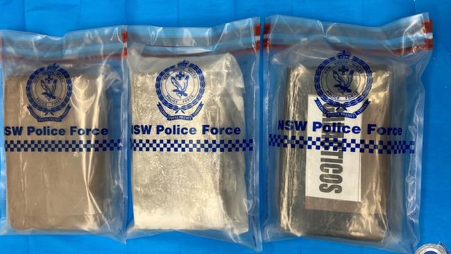 Images supplied by NSW Police show packages of what is alleged to be cocaine found in a car south of Coffs Harbour. Police allege the packages, weighing 3.6kg, are worth about $900,000.