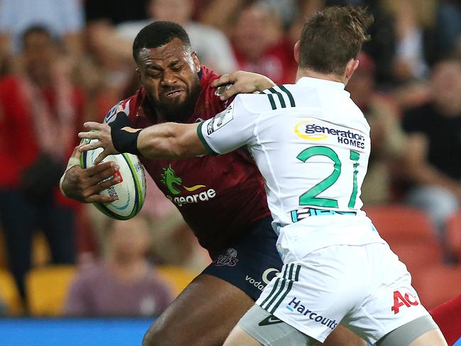 Reds player Samu Kerevi is tackled during the round 10 Super Rugby game between the Queensland Reds and the Chiefs at Suncorp Stadium in Brisbane, Saturday, April 21, 2018. (AAP Image/Jono Searle) NO ARCHIVING, EDITORIAL USE ONLY