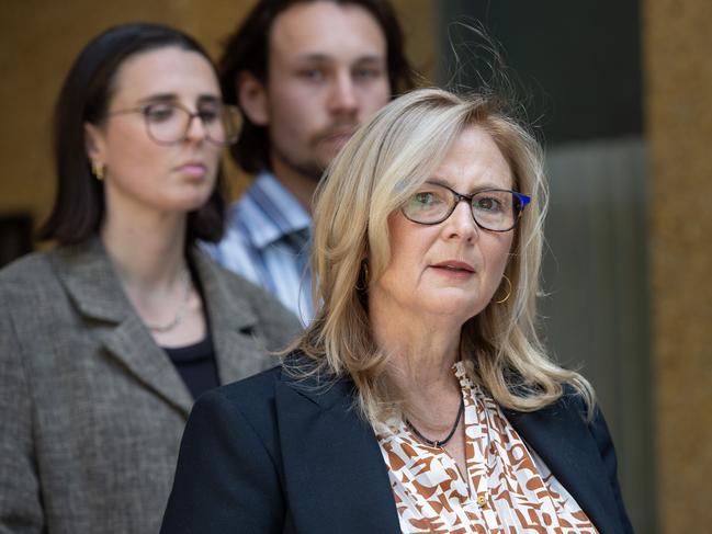 Kirsten McMahon, mother of schoolboy Lachlan Cook, who died after falling sick on an international school trip in Vietnam, speaks to the media outside the Coroners Court of Victoria, along with her family. Picture : NCA Newswire / Nicki Connolly