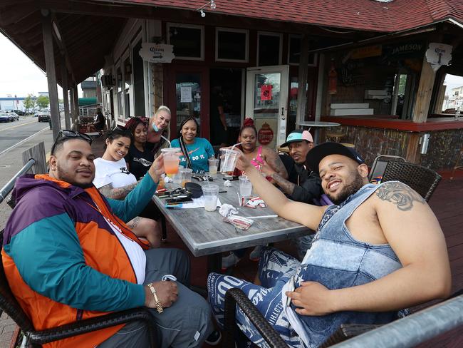 People dine at Hurricane Harry's on the Nautical Mile in Freeport, New York. Picture: Getty Images/AFP