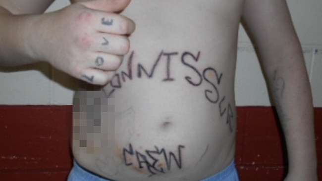 A large, sexually explicit message tattooed on the Yatala inmate’s stomach. He has told prison authorities he was drugged, raped and forcibly tattooed by other inmates over three days.