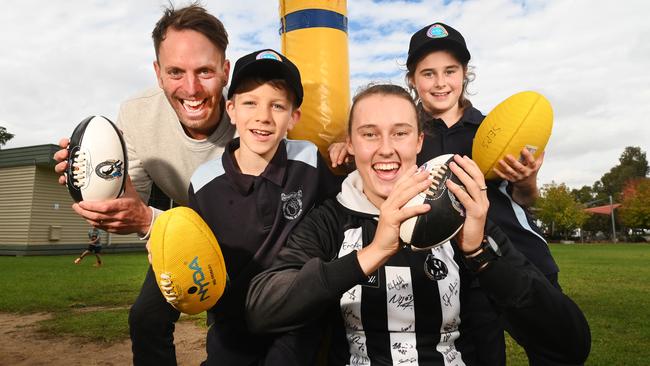 . Towards a better future. Resilience project .Collingwood WAFL player Jordan Allen  and Hugh Van Cuylenburg with Shepparton East primary school students Alex and Lexi .Picture:Rob Leeson