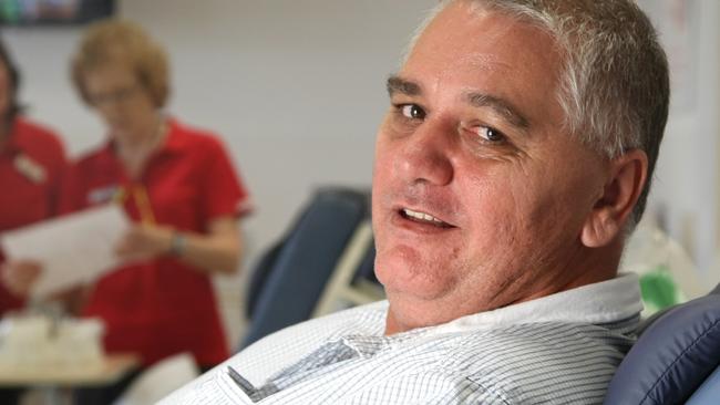 Keith William Marshall, pictured here giving a blood donation, is on trial for the rape and indecent treatment of a 12-year-old girl.