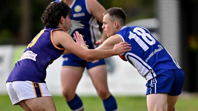 EDFL: Jacana’s Benjamin Gough tries to stop Coburg Districts’ Hayden Clark. Picture: Andy Brownbill