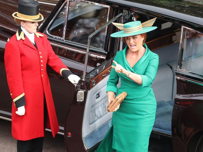 She's back. ‘Fergie’ looked stunning in bright green. And what a hat! Picture: Getty