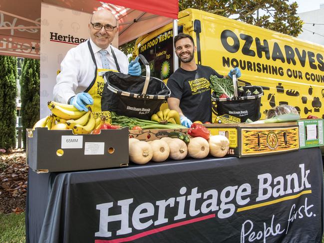 Heritage Bank CEO Peter Lock and Anthony Dunne, Qld manager OzHarvest. Heritage Bank announce partnership with OzHarvest. Wednesday 9th Dec 2020