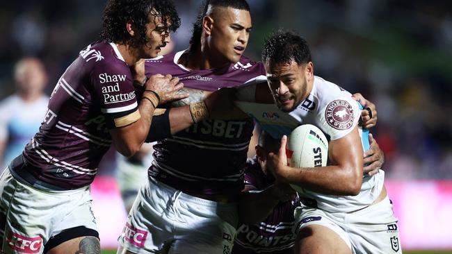 SYDNEY, AUSTRALIA - APRIL 29:  Phillip Sami of the Titans is tackled during the round nine NRL match between Manly Sea Eagles and Gold Coast Titans at 4 Pines Park on April 29, 2023 in Sydney, Australia. (Photo by Matt King/Getty Images)