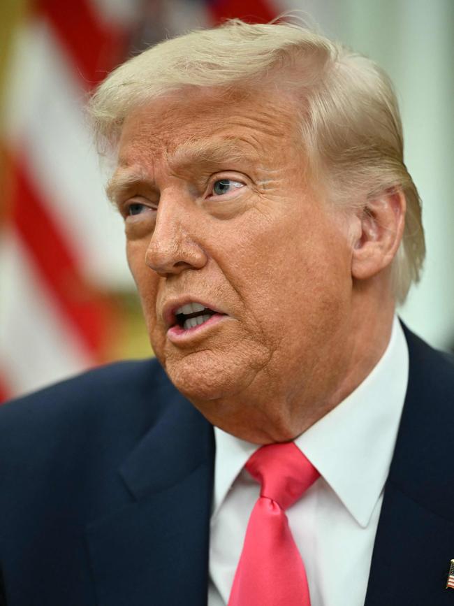 US President Donald Trump speaks as he prepares to sign executive orders in the Oval Office of the White House in Washington, DC on March 6. Picture: Mandel Ngan/AFP