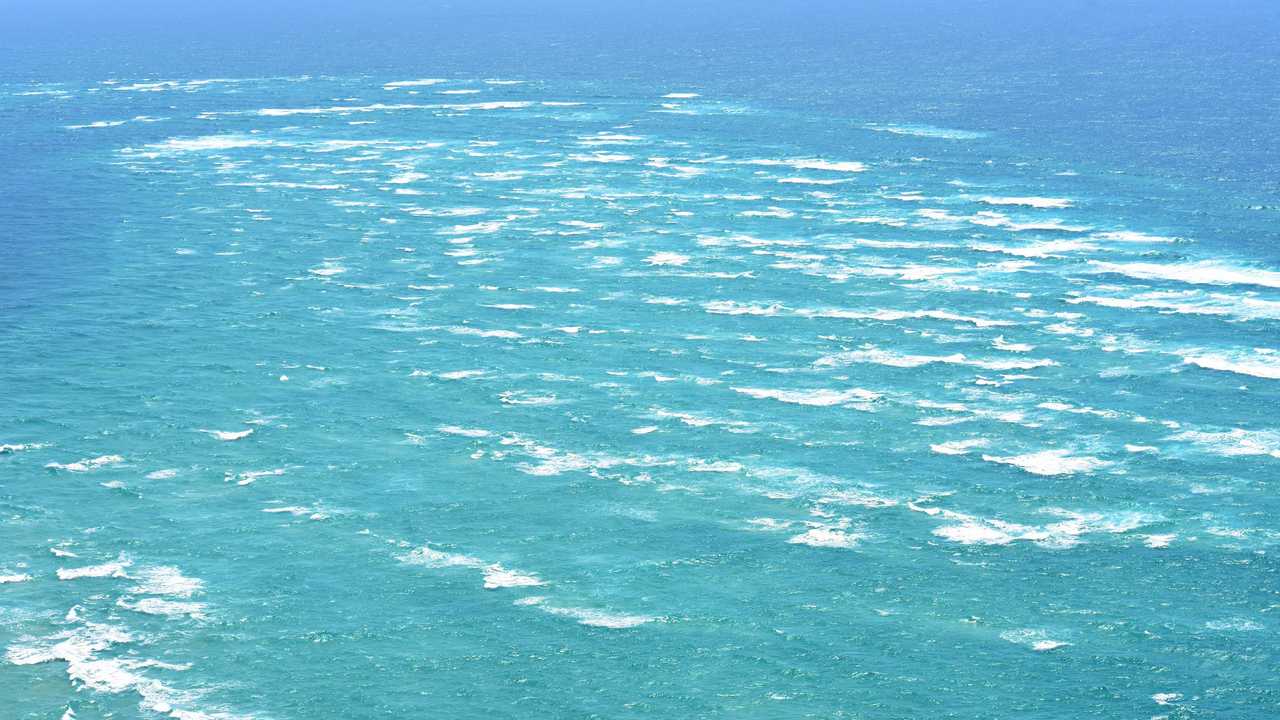 RESCUE REFORM: The notorious Wide Bay Bar, between Inskip Point and Fraser Island, has been the scene of many Coast Guard rescues, escorts and emergency assistance missions. Picture: Arthur Gorrie