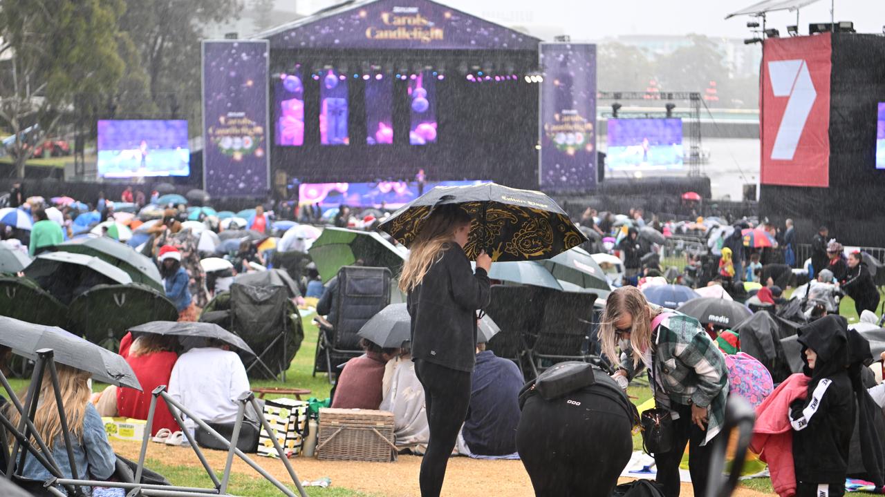 Rain at the Sealink Carols By Candlelight in Elder Park. Picture: Morgan Sette