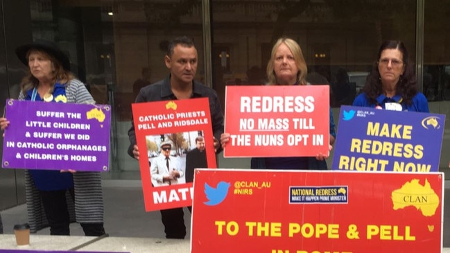 Protesters outside the court where George Pell will be sentenced. Picture: Remy Varga.