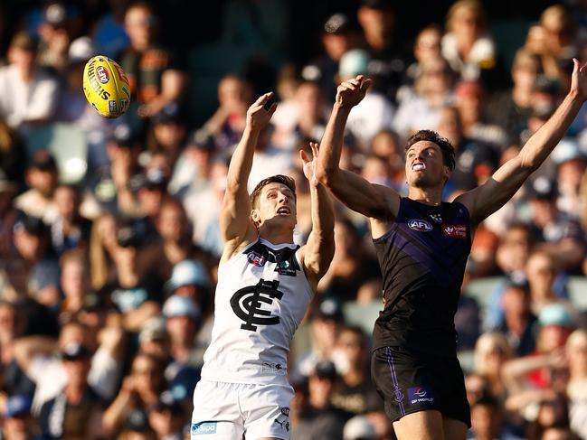 Lachie Fogarty and Ethan Hughes compete for in the air during Gather Round. Picture: Michael Willson/AFL Photos via Getty Images.