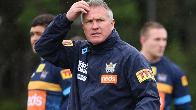 Garth Brennan did his best at the Titans but was left scratching his head as his underperforming players failed to fire. Picture: Dave Hunt/AAP.