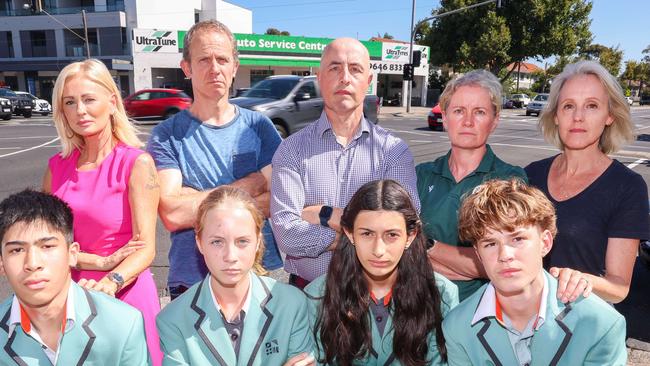 Parents Niki Munoz, John Symons, Christopher Scanlon, Denise Linnane and Sally OShannessy with students Kayden Kortez, Maja Symons, Estelle Centurion and Aldi Williams from Port Melbourne Secondary College say the intersection of Williamstown Rd and Graham St in Port Melbourne needs to be improved. Picture: Brendan Beckett