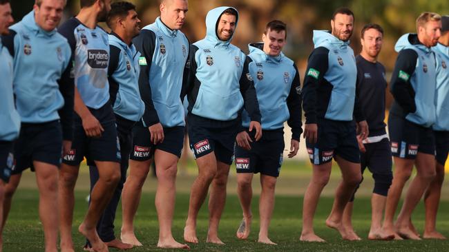 The Blues get some grass under their feet at training. (Brett Costello)