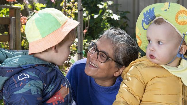 (From left) Elijah Usher, Georgette Ahfock and Scott Paterson. Georgette Ahfock is recognised for her commitment to excellence in early childhood education and care. Picture: Nev Madsen.