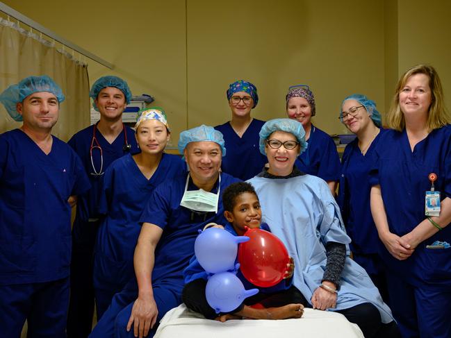 The surgical team with Robinson. Picture: Justin Clark