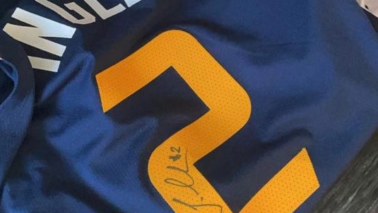 Joe Ingles signed his Utah Jazz singlet and gave it to fellow Aussie Josh Giddey when the pair clashed.