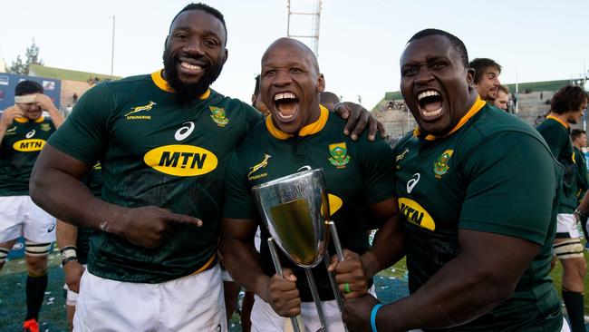 South Africa's players Tendai Mtawarira, left, Bongi Mbonambi, centre, and Trevor Nyakane celebrating after winning the 2019 Rugby Championship. Picture: Juan Gasparini/AFP