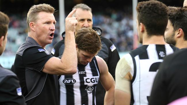 Nathan Buckley speaks to his players at three-quarter time. Picture: Wayne Ludbey