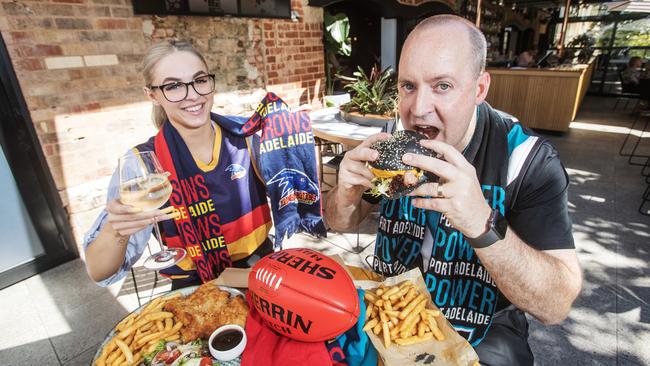 Lauren Green and Tim Riemann from the Strathmore Hotel are excited about the return of the AFL Football Season, 10 March 2023. Picture Simon Cross