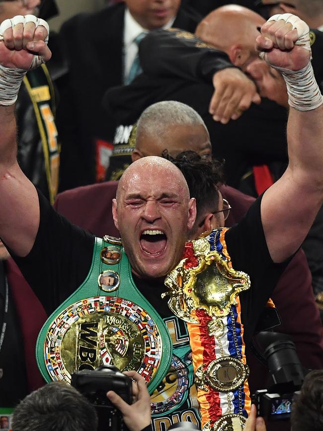 Tyson Fury celebrates winning the pair’s second fight. Picture: Mark Ralston/AFP