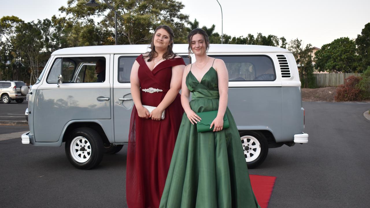 RIVERSIDE FORMAL: Rika Van Gerrisheim and Olive Rice Ranger arrive in a cool blue Kombi Van at the Riverside Christian College Formal. Photo: Stuart Fast