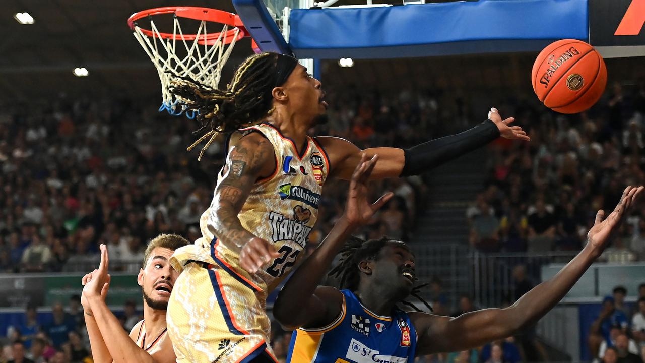 BRISBANE, AUSTRALIA - 2023: Tahjere McCall of the Taipans and Gorjok Gak of the Bullets compete for the ball in Brisbane, Australia. (Photo by Albert Perez/Getty Images)