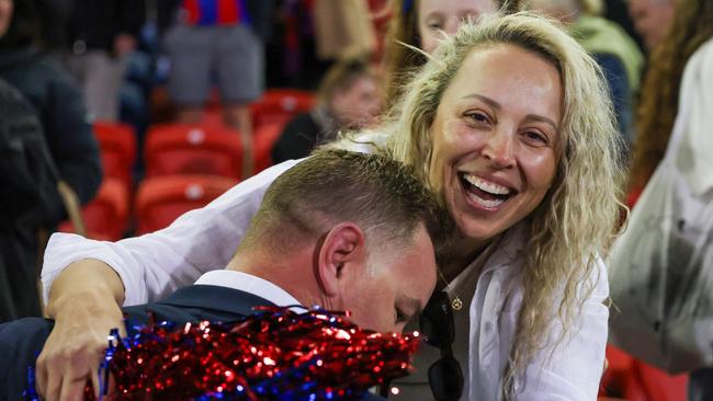 O'Brien embraces his wife Sharyn after the Knights’ Round 26 win over Cronulla. Picture: Getty Images.