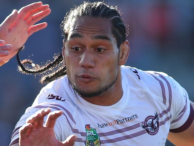 PENRITH, AUSTRALIA - JUNE 30:   Martin Taupau of the Sea Eagles fends off Nathan Cleary of the Panthers during the round 16 NRL match between the Penrith Panthers and the Manly Sea Eagles at Panthers Stadium on June 30, 2018 in Penrith, Australia.  (Photo by Tony Feder/Getty Images)