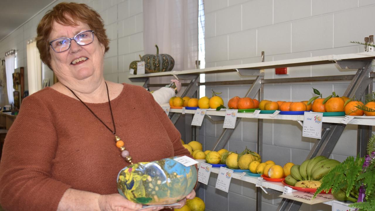 Proud grandmother Julianne O'Brien of Proserpine with her 5-year-old granddaughter Lily O'Brien's prizewinning pumpkin at Show Whitsunday on Saturday. Picture: Kirra Grimes